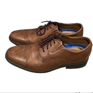 Men’s dark tan leather dress shoes. Worn only a few times in great condition.
